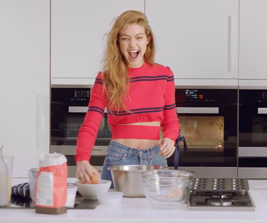 Slim girl prepares herself a healthy breakfast